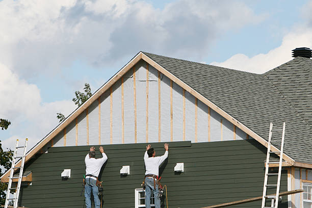 Professional Siding Contractor technician working in Wampum, PA